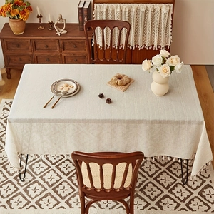 Rustic beige striped linen tablecloth with decorative tassel trim for rectangular tables
