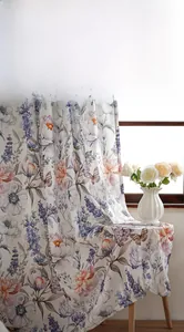 Close-up of butterfly and floral print on semi-blackout curtains with fine stitching