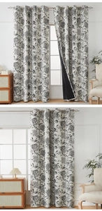 Detail view of floral blackout curtains with black liner and grommet top header