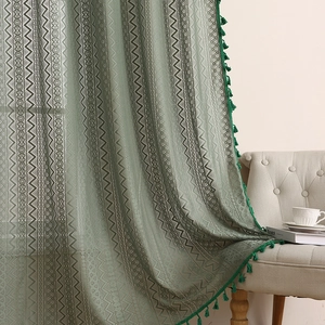 Dark green bohemian lace curtain with geometric patterns and handcrafted tassel edges