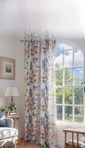 Detailed view of pastoral butterfly and lavender floral print on semi-shading curtain fabric