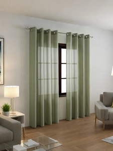 Detail of sage green vertical striped sheer curtain with silver metal grommet top headers