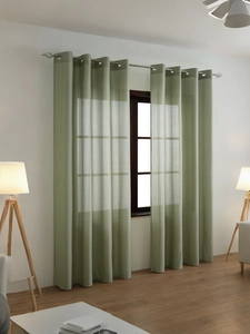Detail of light green vertical striped sheer curtains with grommet top in a modern living room