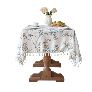 Thick American pastoral tablecloth with vintage floral and bird prints and tassel edges