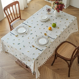 Waterproof cream tablecloth with yellow floral embroidery and white decorative tassels