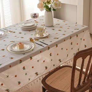 Beige floral embroidered linen tablecloth with tassels for elegant home dining decor