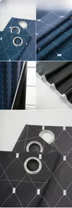 Detail of blackout curtain with geometric diamond pattern and silver metal grommets
