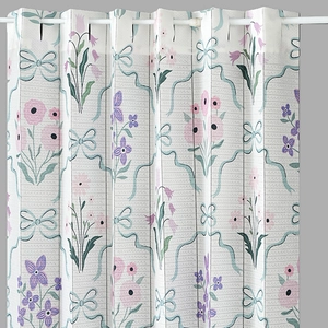 Floral printed folding door curtain with pink blossoms and white grommet top hooks