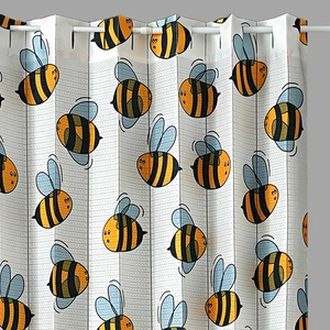 Detail of cartoon bee print folding curtain with blue stripes for home kitchen partition