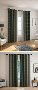 Detail of dark green and grey blackout curtain with white geometric diamond patterns