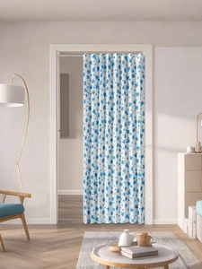 Detail view of a floral printed folding door curtain with blue flowers for home partition