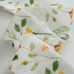 Close-up of fresh orange floral pattern on white mesh textured folding door curtain