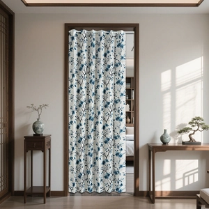 Detail view of long split folding door curtain with blue floral zen pattern for room divider