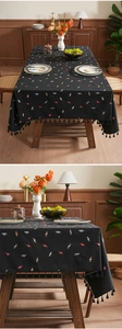 Detailed embroidery of colorful candy patterns on thick black cotton linen tablecloth