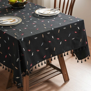 Black fabric tablecloth with colorful candy embroidery and decorative black fringe tassels