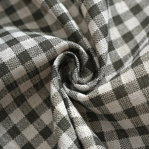 Short linen cafe curtain with black and white plaid pattern and woven texture for kitchen