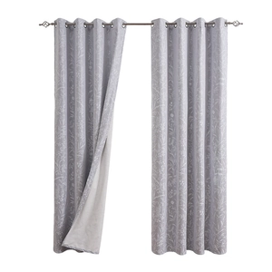 Grey blackout curtains with white floral pattern and silver metal grommets for living room