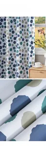 Close-up of Nordic blackout curtain fabric with colorful polka dots and woven texture
