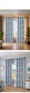Detail view of modern blackout curtain with colorful polka dot pattern and metal eyelets