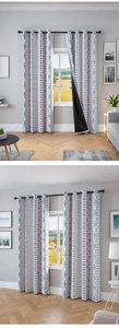 Detail view of modern geometric blackout curtains with back lining and metal grommet top