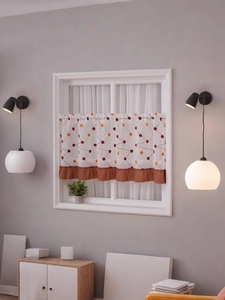 Detail of Nordic coffee curtain with geometric patterns and pleated brown trim