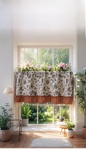 Detail of floral cafe curtain with ruffled trim and botanical prints in a cozy home setting