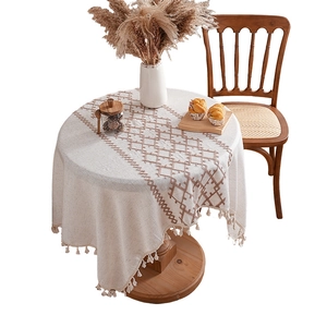 Thick linen embroidered round tablecloth with diamond patterns and decorative tassels