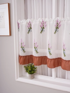Detailed embroidery of lavender flowers and terracotta ruffle on white cafe curtain