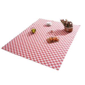 Classic red and white checkered picnic mat with waterproof fabric and neat edges for outdoor