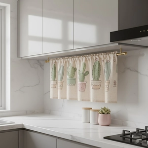 Linen coffee curtain with cactus print and rod pocket hanging in a modern kitchen