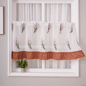 White cafe curtain with lavender embroidery and orange ruffled hem for kitchen window