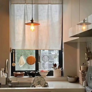 Japanese style beige linen door curtain with industrial pendant light in kitchen scene