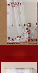 Detail of Christmas sheer curtain with embroidery of Santa and festive snowflakes