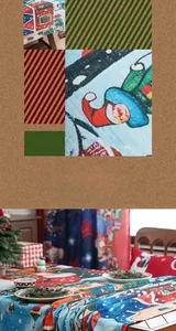 Detail of Christmas tablecloth fabric texture with Santa Claus and snowflake prints