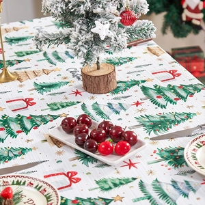 Christmas polyester tablecloth with green trees and red gift prints for holiday dining