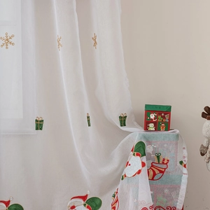 White semi-transparent Christmas sheer curtain with festive snowflake and Santa embroidery