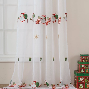 White voile Christmas curtain with embroidered Santa Claus, snowflakes and festive socks