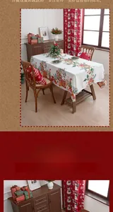 Detailed Christmas tablecloth featuring festive snow house patterns and red holly berries