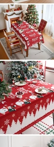 Detail of red Christmas tablecloth featuring snowmen patterns and holiday greetings