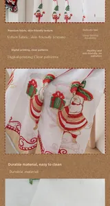Close-up of velvet Christmas fabric showing Santa and tree digital prints and texture