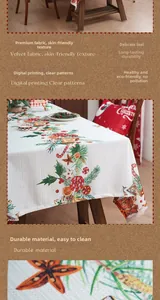 Detail of soft velvet fabric Christmas tablecloth with candy cane and pine branch prints