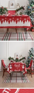 Detail of Christmas tablecloth and chair covers with snowmen and festive patterns