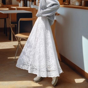 Elegant white paisley lace A-line maxi skirt with intricate crochet floral patterns