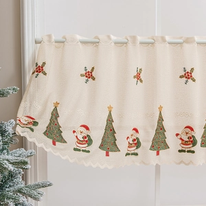 Christmas sheer lace valance with embroidered Santa and trees on scalloped white fabric