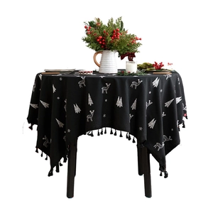 Black Christmas linen tablecloth with white reindeer and festive embroidery details