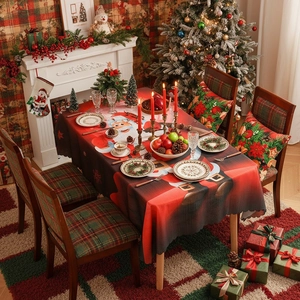 Christmas tablecloth with cartoon Santa print and wavy edges on a decorated festive table