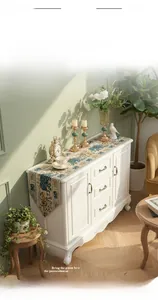 Close-up of luxury American style chenille table runner with blue embroidery and fringe