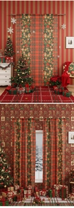 Close-up of Christmas curtains with red green plaid and pine cone wreath holiday patterns