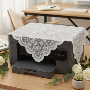 White floral lace dust cover with scalloped edges for printers and small furniture