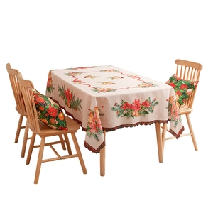 Christmas tablecloth set with poinsettia prints and festive bells for dining table decoration